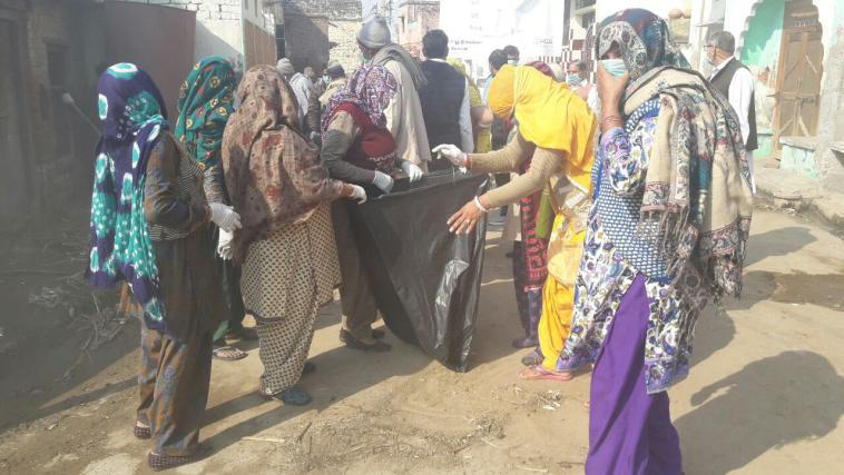Villagers in the millennium city rise to the sanitation challenge