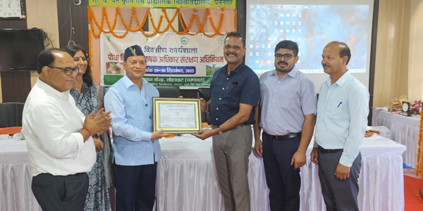 N.P Singh receiving the certificate